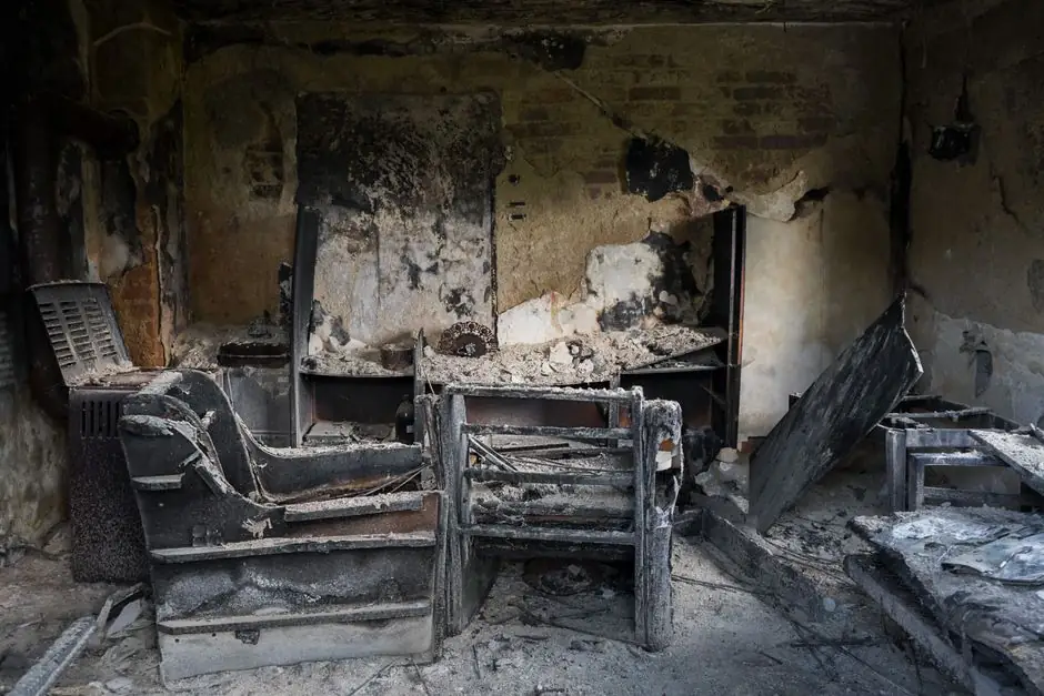 Why is there a lingering smoke odor after fire damage?